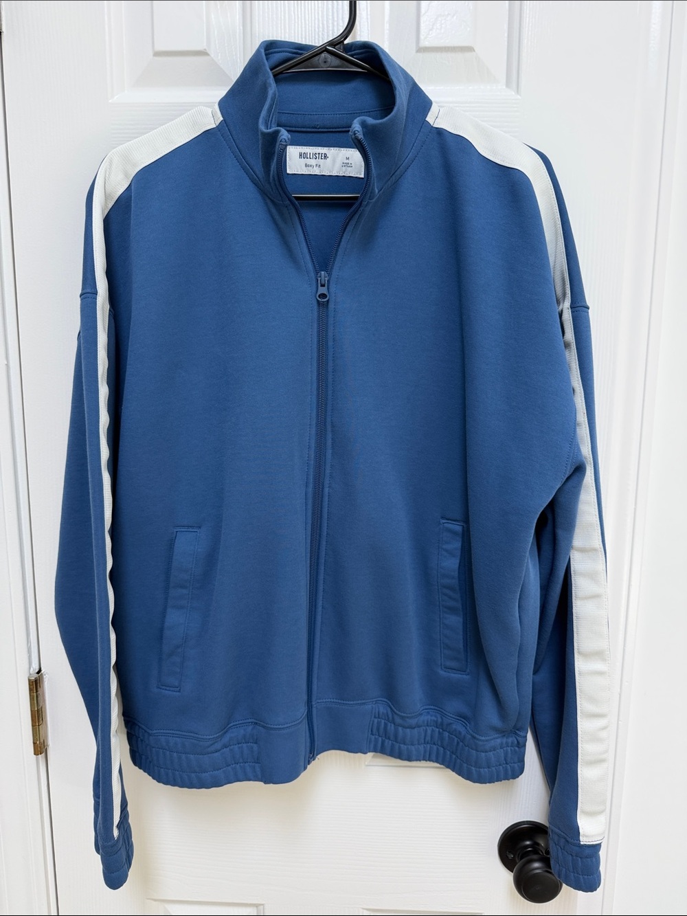 Hollister Men's Blue Zip-Up Track Jacket with White Stripes